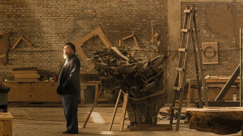 Ai Weiwei with his artworks