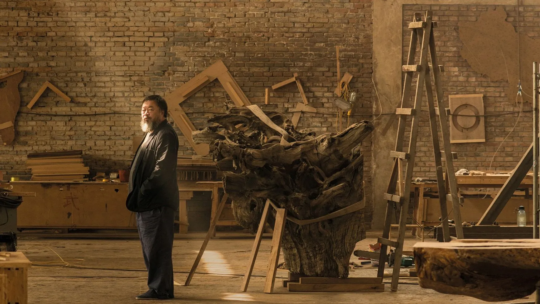 Ai Weiwei with his artworks