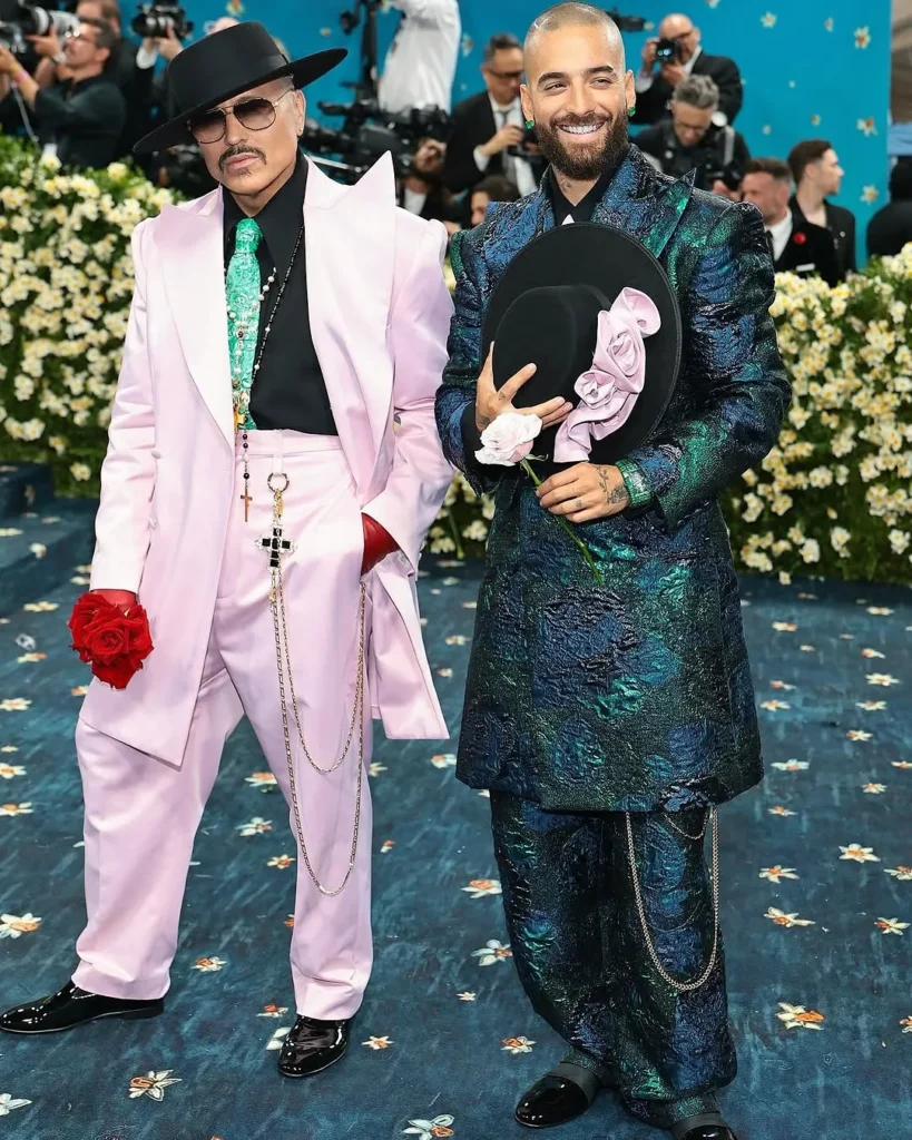 Willy Chavarria with another man in masculine dress nd jwellry