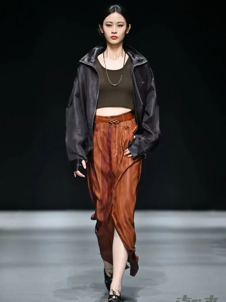 a female on ramp showcasing Era Kuang look