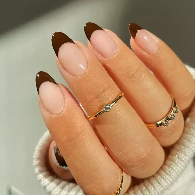 Chocolate Brown frnch tips on oval nails