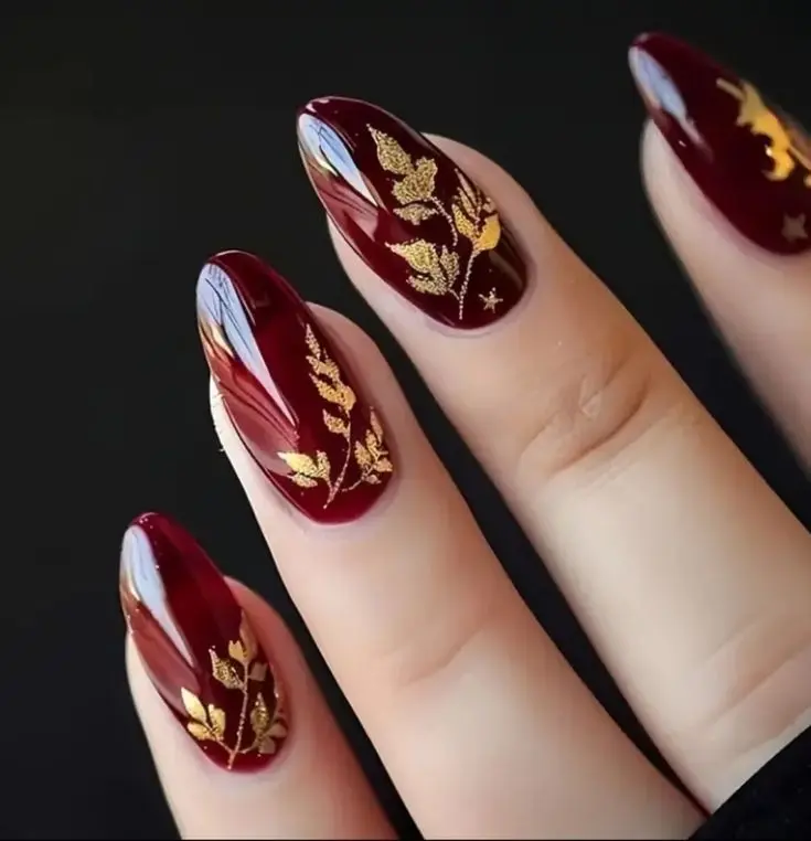 Long Burgundy and Gold Oval Nails